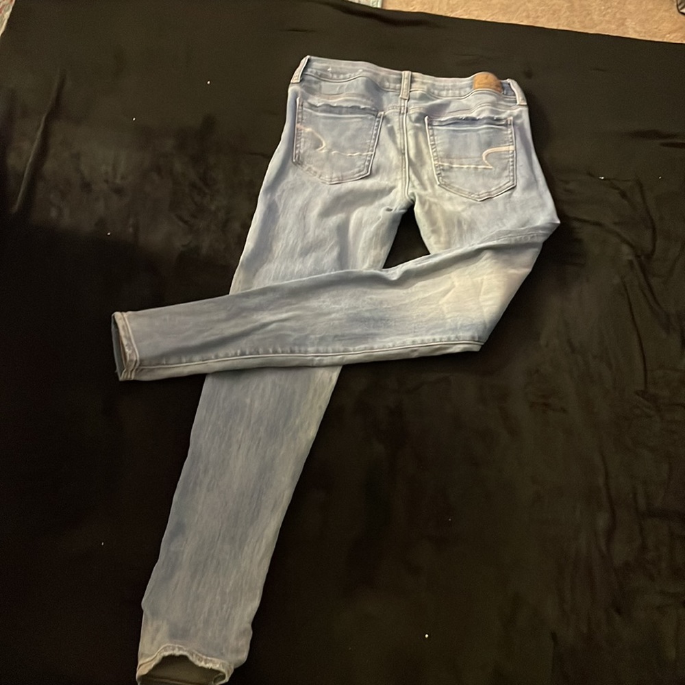 Medium wash American eagle denim skinny jeans